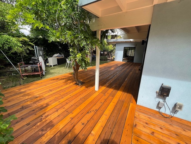 Restored cedar deck after professional cleaning, sanding, and staining in Palo Alto.