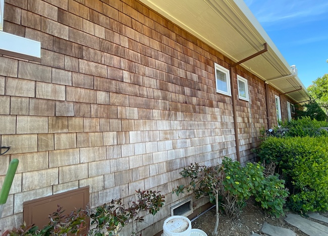 Faded cedar shingle siding in Cupertino before cleaning and restoration
