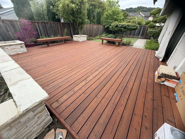 Redwood deck in Cupertino after light sanding and application of oil-based stain