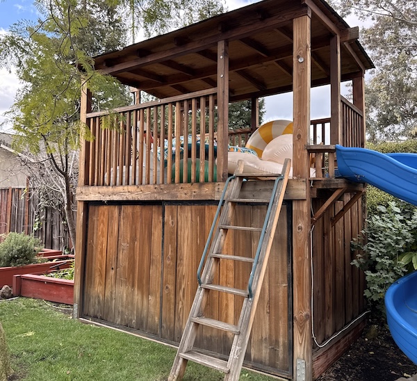 Weathered wood play structure in Cupertino before cleaning, sanding, and staining