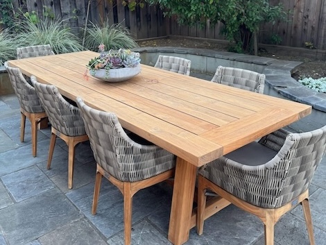 Restored teak dining table after professional refinishing in Los Gatos, CA