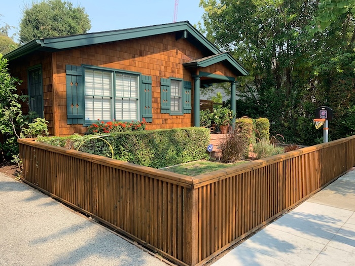 Cedar shingle siding and wood fence in Palo Alto after professional cleaning and staining