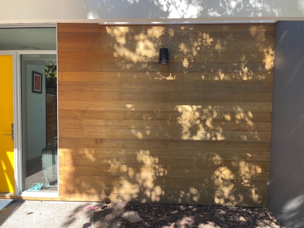Weathered cedar siding in Palo Alto before sanding and refinishing
