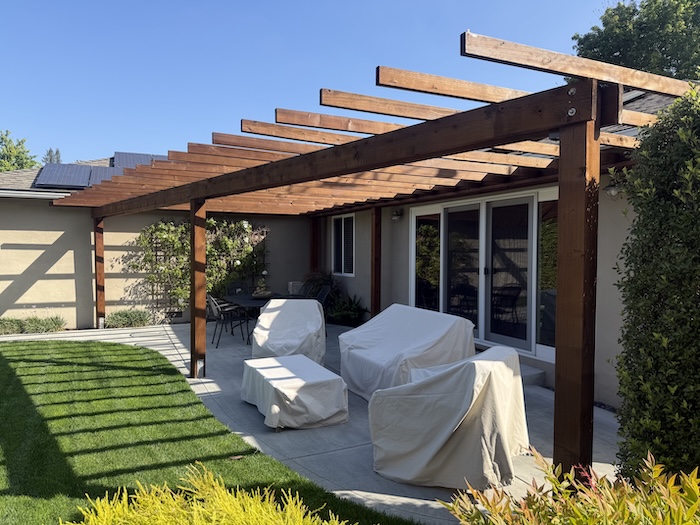 Wood pergola in Palo Alto after pressure washing and natural dark brown oil-based staining