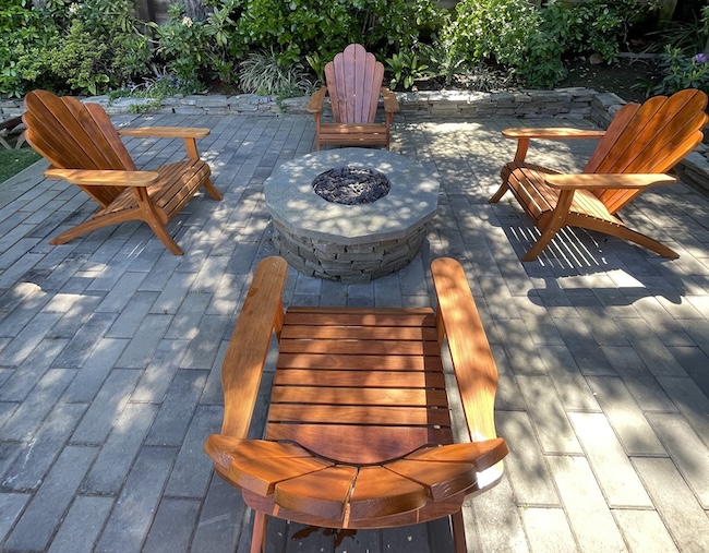 Restored teak patio seating set after professional refinishing in San Mateo, CA
