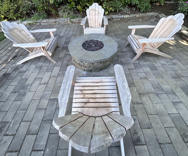 Weathered teak patio seating set before restoration in San Mateo, CA