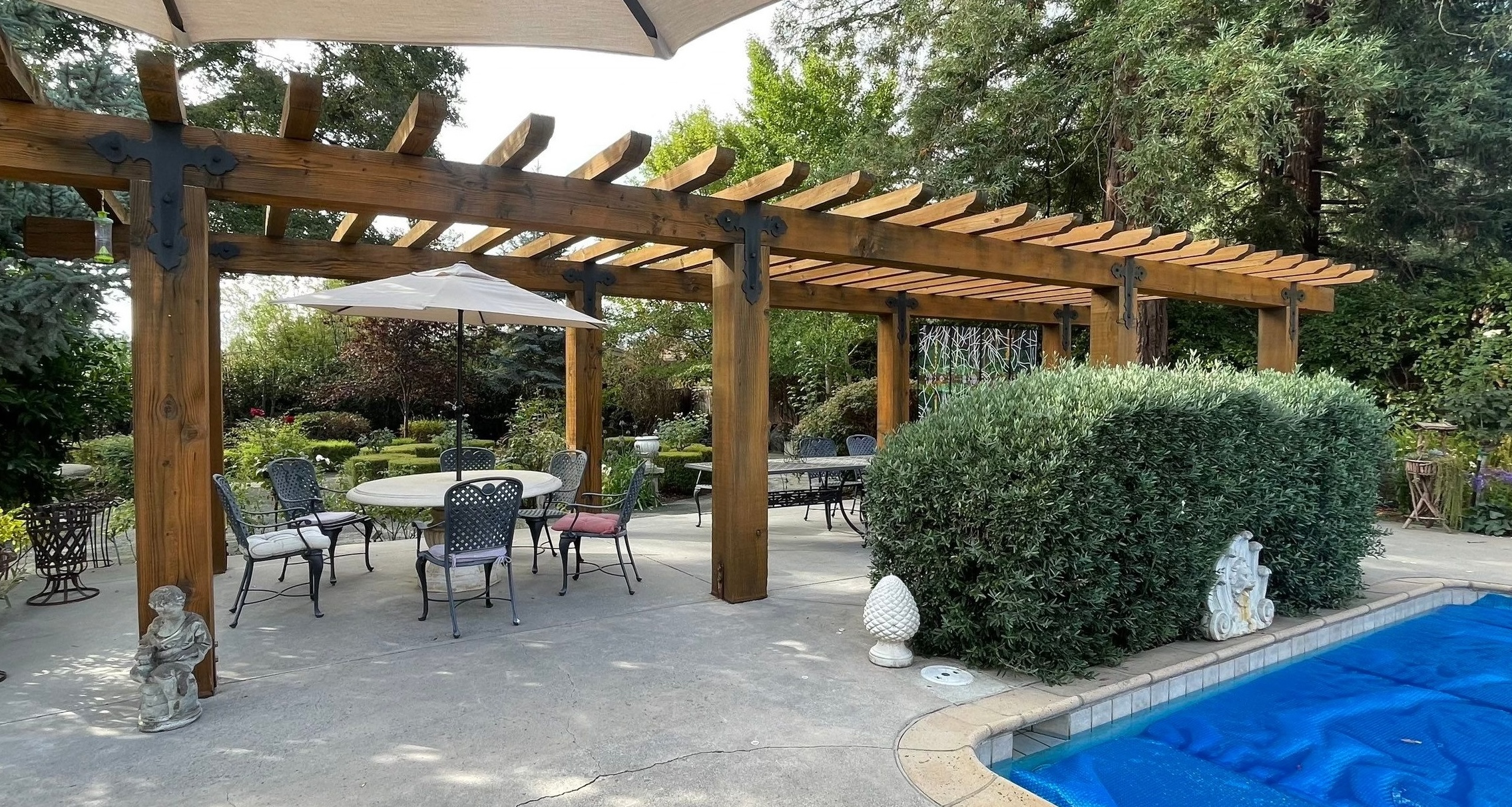 Wood pergola in Saratoga after professional pressure washing and staining