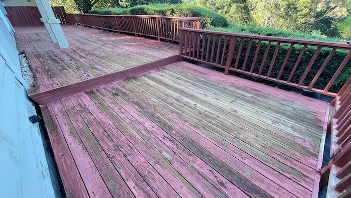 Redwood deck in Saratoga with peeling and flaking solid stain before refinishing