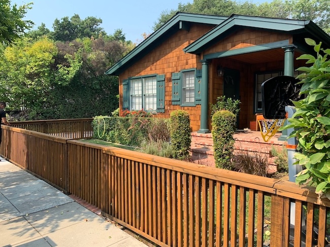 Restored cedar shingle siding after professional refinishing and semi-transparent staining in Palo Alto, CA.