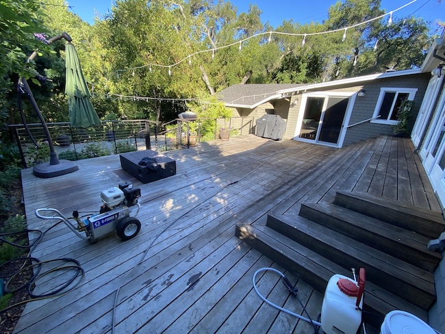 Weathered IPE hardwood deck before refinishing in Los Gatos, California showing faded gray boards and weathered wood surface
