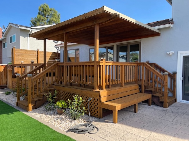 Redwood deck after refinishing in San Jose, California with restored natural color and a semi-transparent cedar stain finish