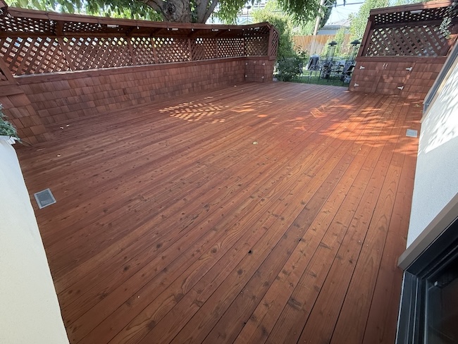 Restored redwood deck after professional cleaning, refinishing, and staining in Santa Clara.