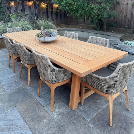 Restored teak dining table after professional refinishing in Los Gatos
