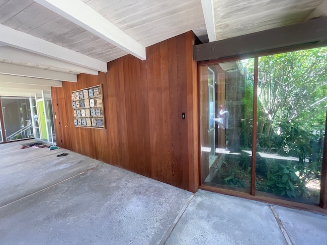 Restored redwood siding in Oakland after professional cleaning, refinishing, and protective sealing
