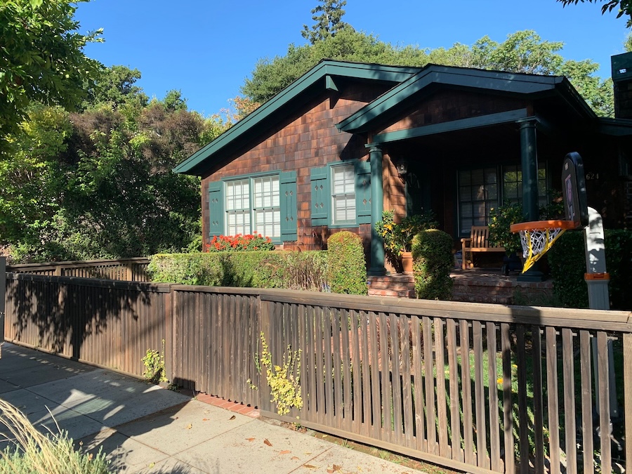 Weathered cedar shingle siding in Palo Alto before professional restoration and refinishing