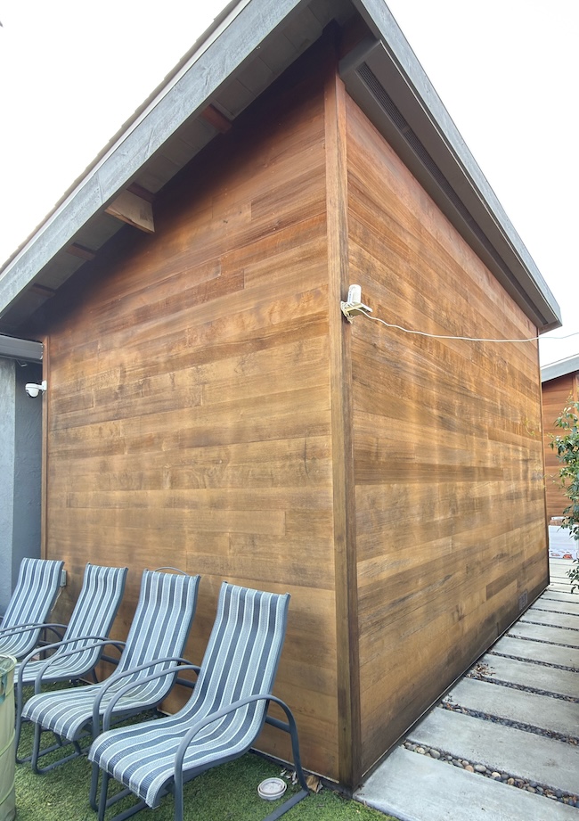 Weathered exterior wood siding in the San Francisco Bay Area before restoration